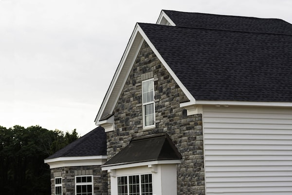 Edge of roof-shingles on top