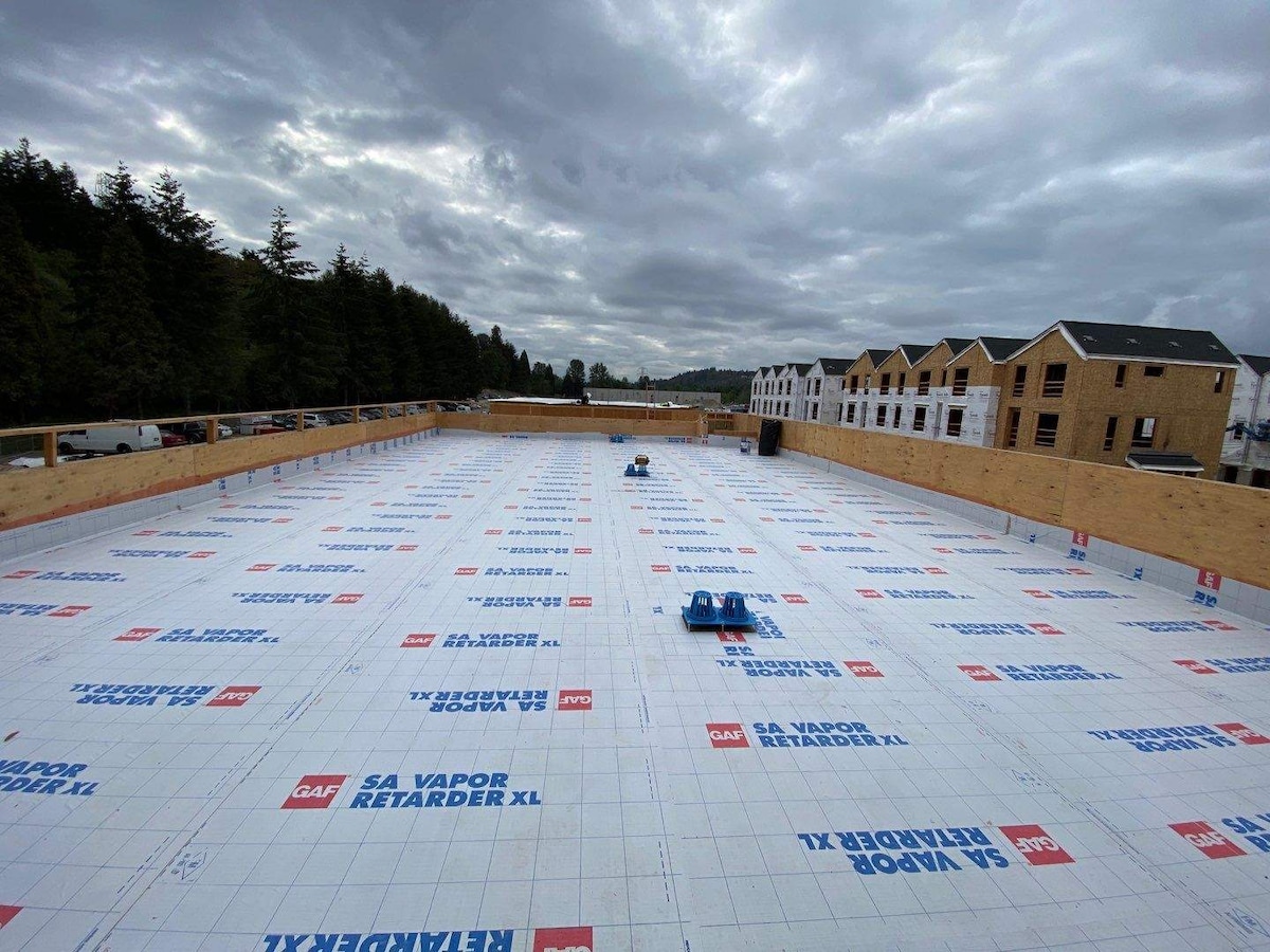 Aerial view of a roof with GAF SA vapor retarder XL preparation