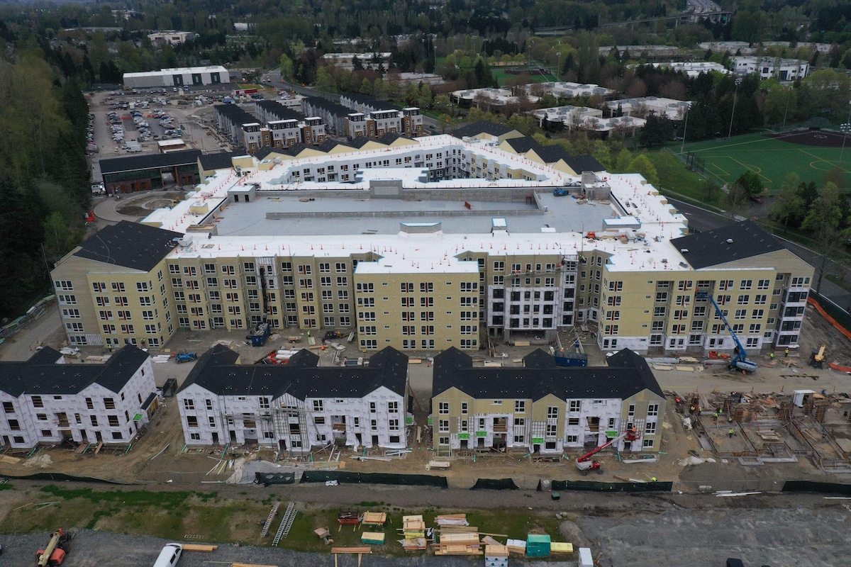 Aerial view of Avalon Bothell Commons community rooftops project under development