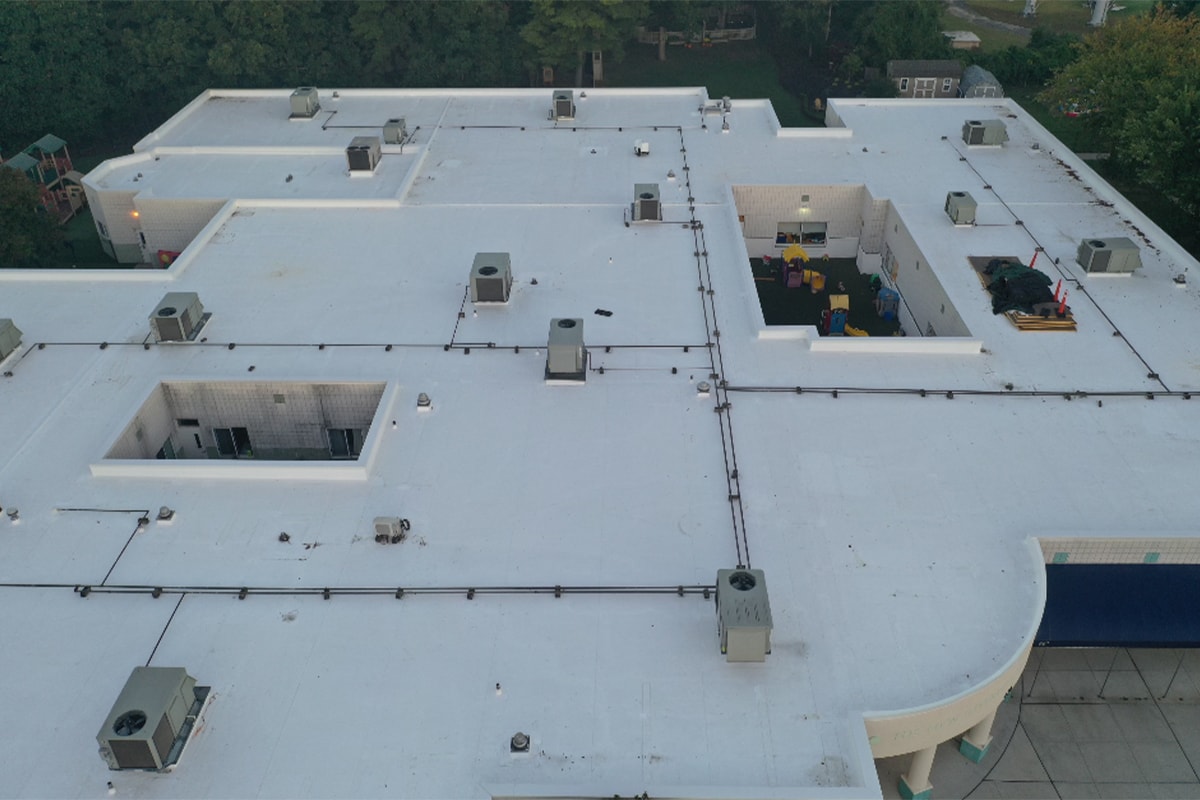 Aerial view of completed school rooftop on The New Interdisciplinary School