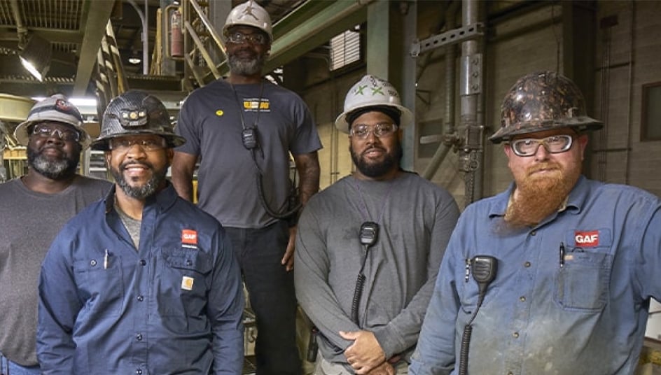 GAF employees working in American manufacturing plant