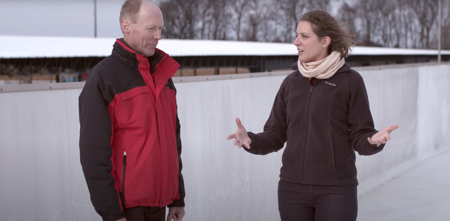 Man and woman discussing the performance of EnergyGuard TPO