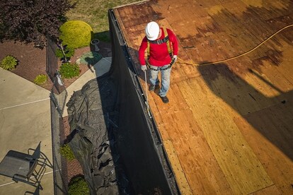 GAF roof contractor repairing damage