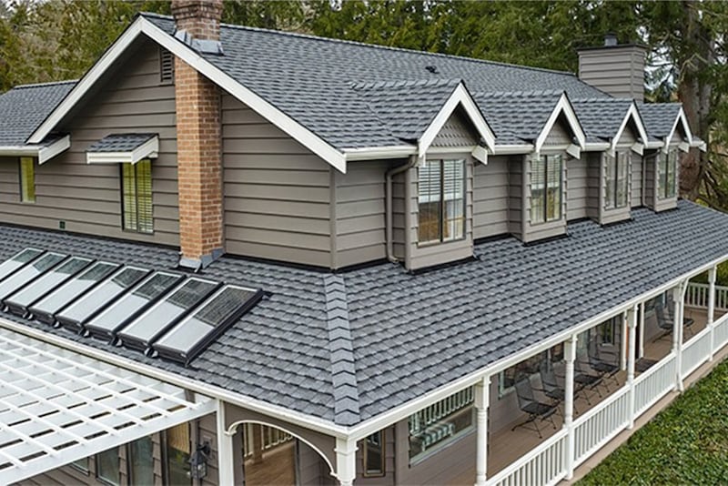 beige house with gray timberline uhdz roof shingles