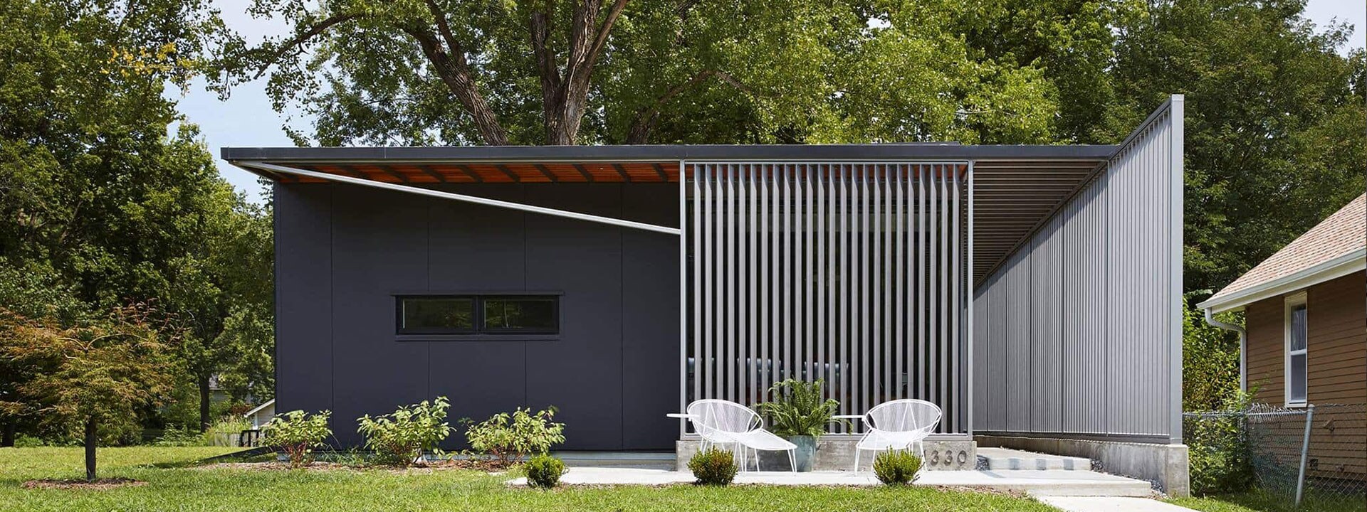 Front view of the Brook Street House's comtemporary sustainable design with GAF roofing materials