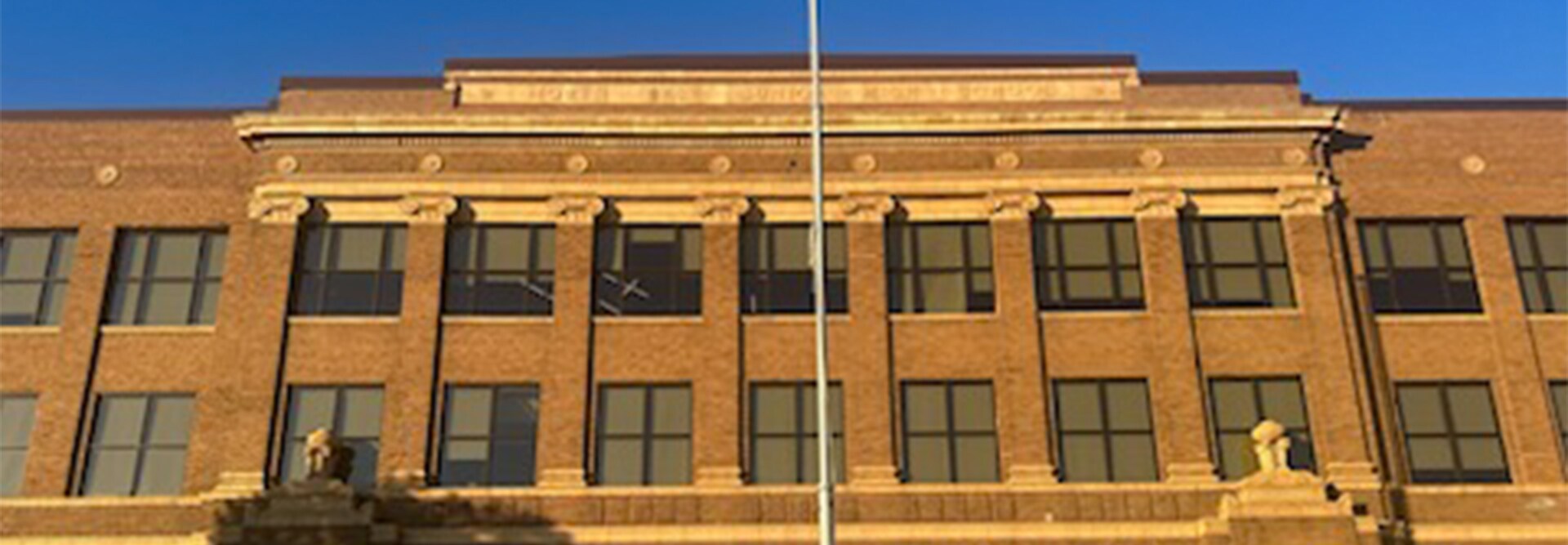 Front view or NorthEast Middle School in Kansas City, MO