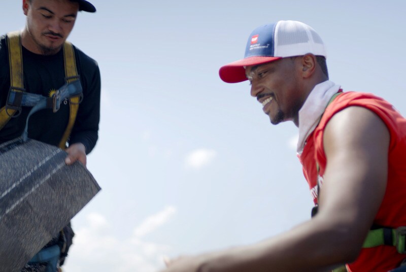 Anthony Mackie helping GAF certified contractor install a new roof